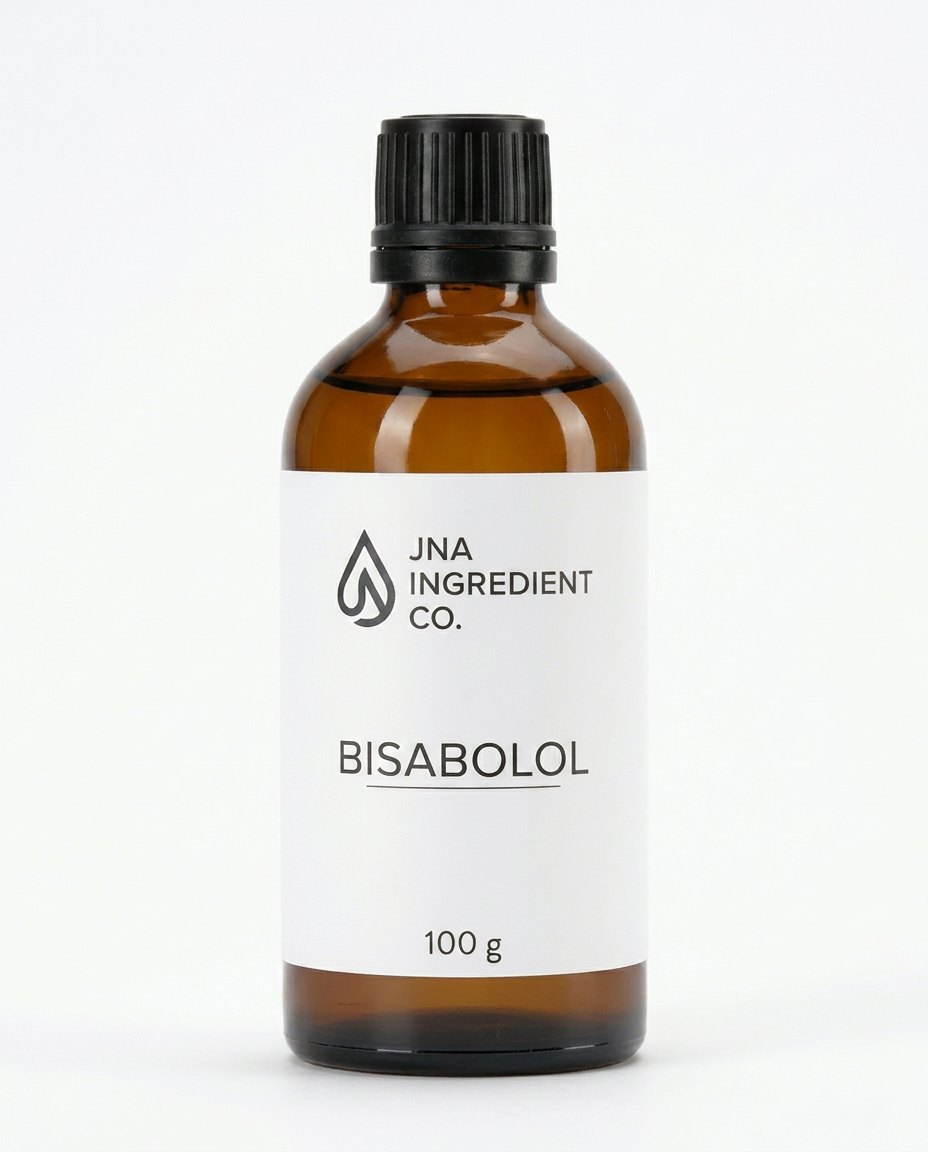 An amber glass bottle of Bisabolol by JNA Ingredient Co. with a white label and a black ribbed cap, set against a plain white background.