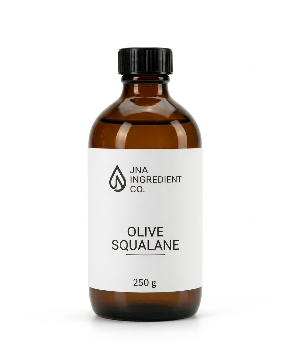 An amber glass bottle of JNA Ingredient Co. Olive Squalane, 250g, with a white label and a black ribbed cap, set against a plain white background.