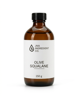 An amber glass bottle of JNA Ingredient Co. Olive Squalane, 250g, with a white label and a black ribbed cap, set against a plain white background.