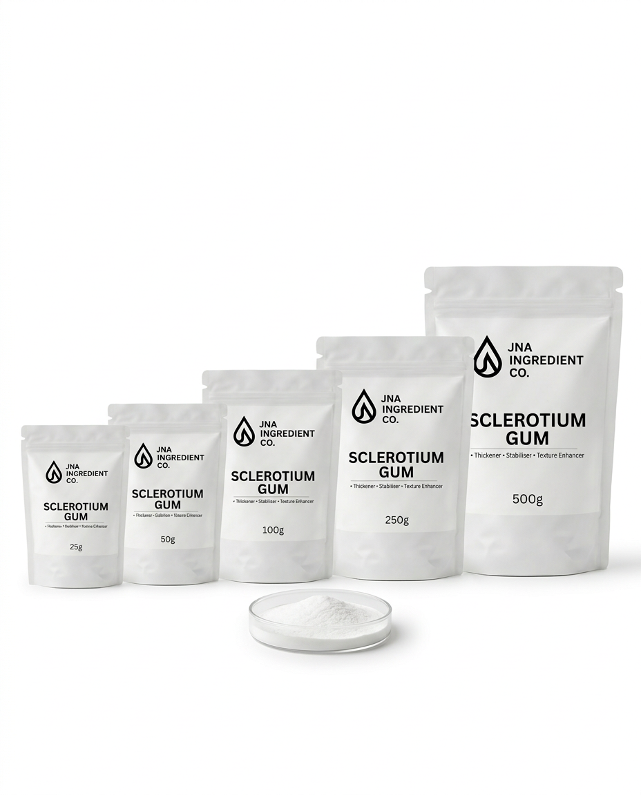 Five white stand-up pouches of JNA Ingredient Co. Sclerotium Gum in sizes 20g, 50g, 110g, 250g, and 500g, arranged in ascending order with a small open dish of white powder in front, on a clean white background. Formulator‑ready Sclerotium Gum for natural viscosity building and improved product stability